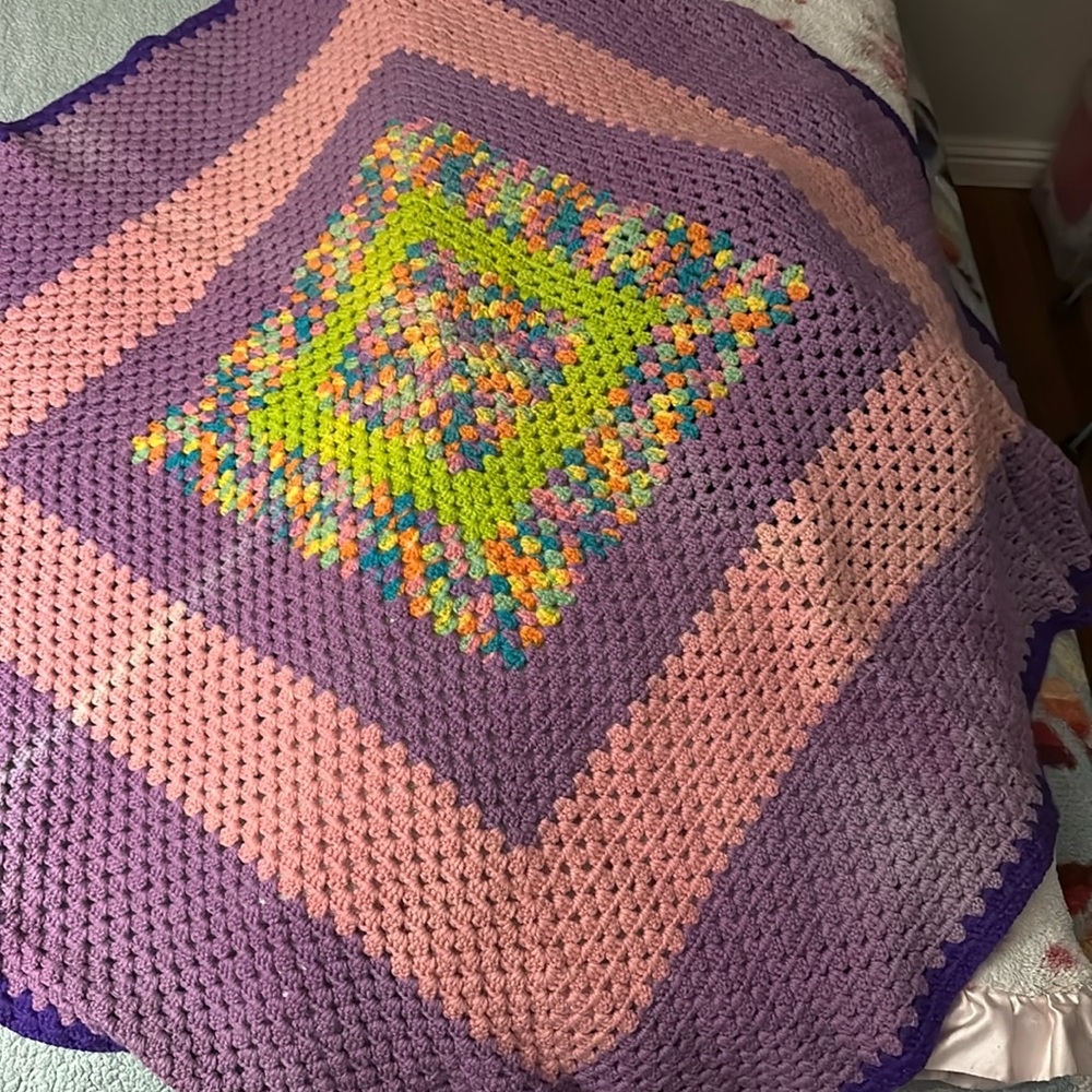 Beautiful crocheted blanket little discolored one side